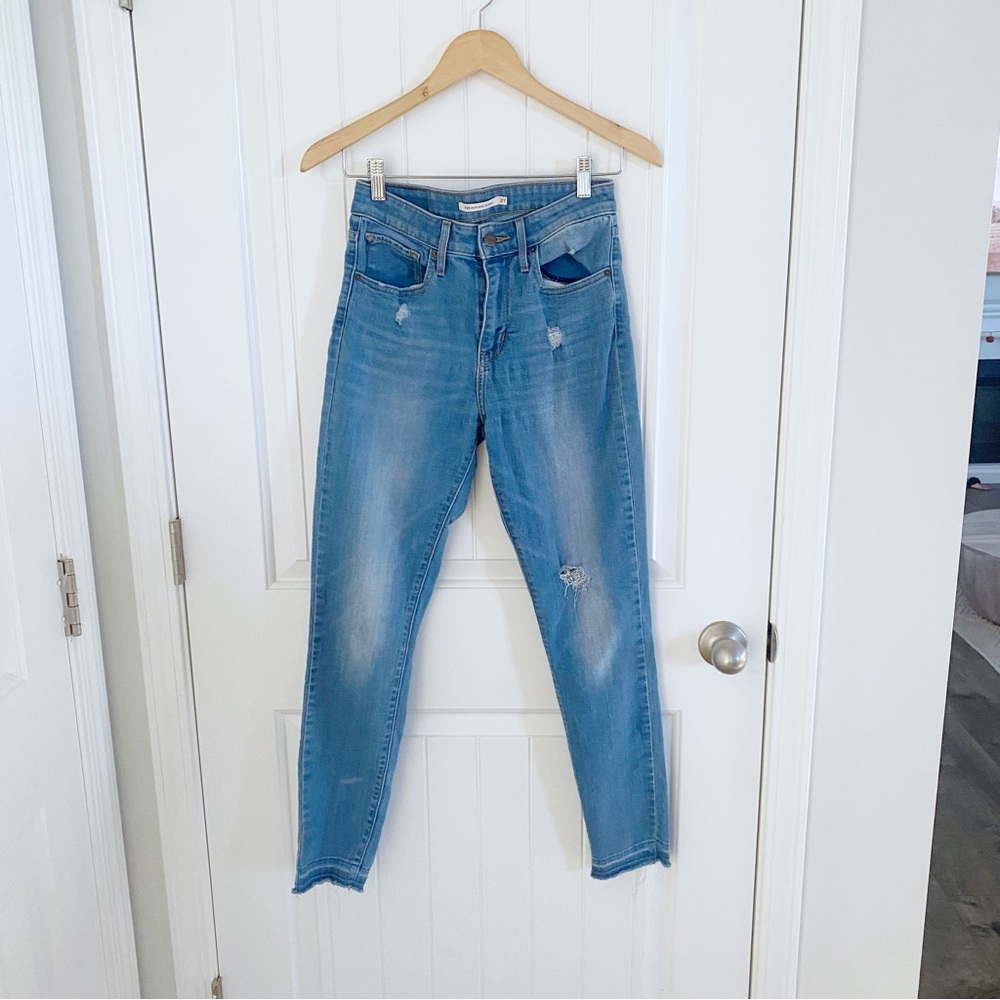 Levi’s 721 High Rise Skinny Distressed Frayed Hem